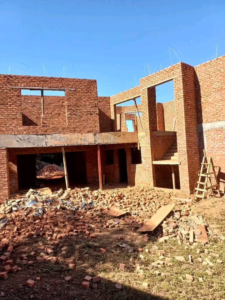 Brick structure with concrete staircase under construction